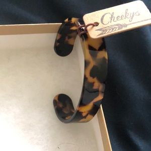 Cheeky’s leopard print plastic cuff bracelet